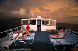 The top deck of the Caribbean Explorer 2 of the coast of ... by Terry Moore 